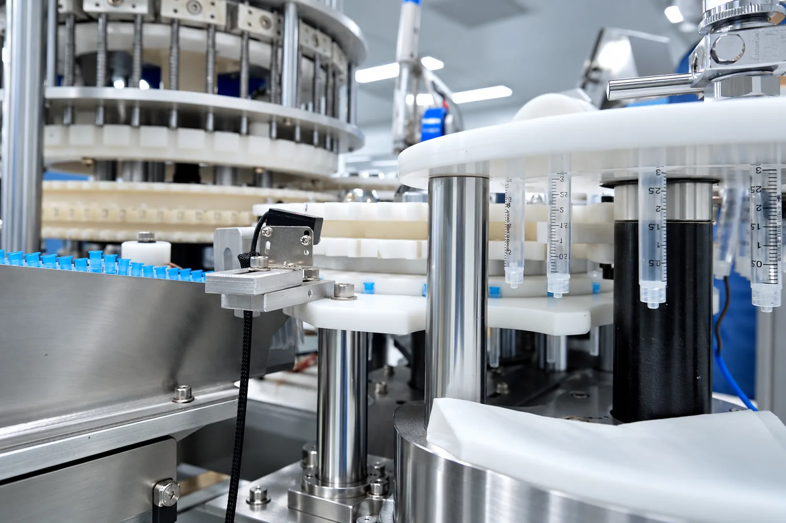 Syringe assembly line close-up